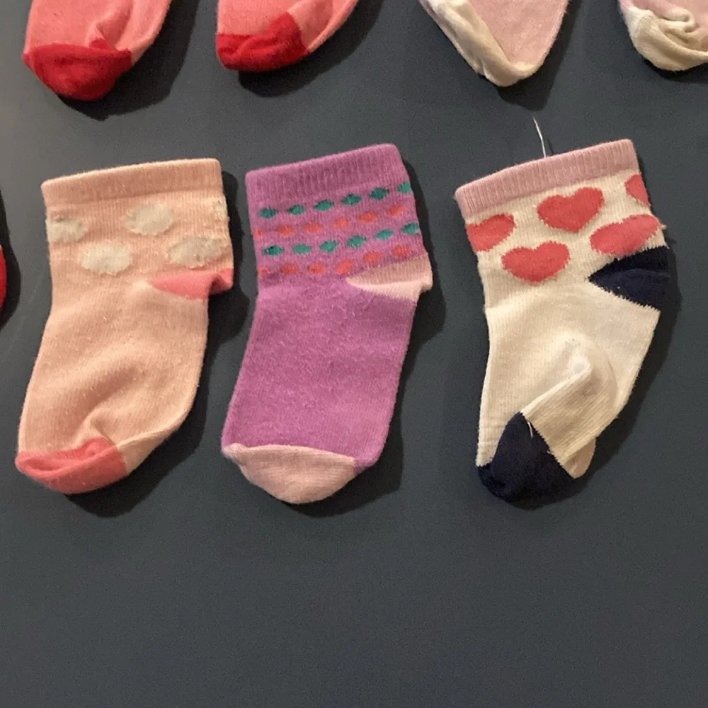 Toddler girl socks clean and washed. 7 pairs or 17 socks. 3 extra socks